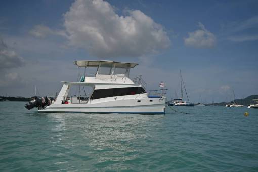 Phuket sunset cruise private boat tour catamaran snorkeling