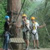 Hooking onto the zip line for safety