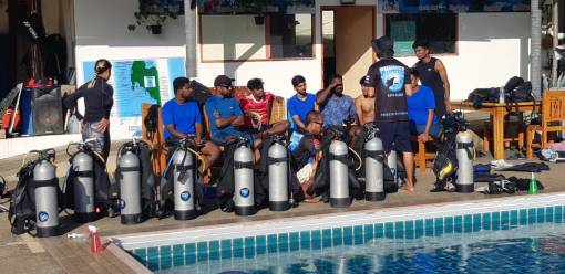 PADI instructor teaching at the pool Discover Scuba Diving